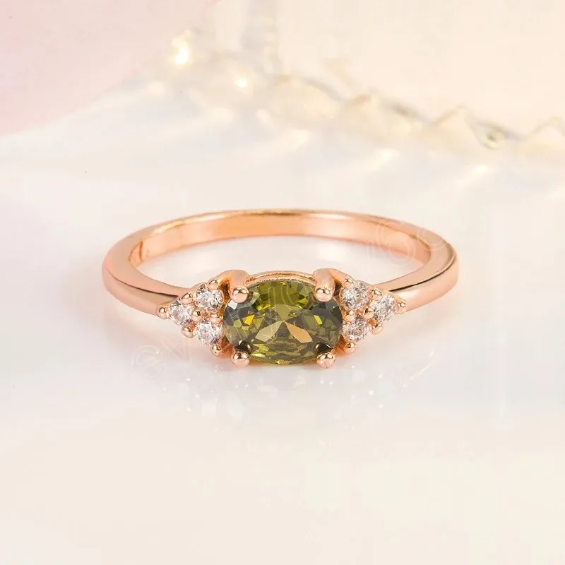 Moda Rosegold Color Classical Imitation anéis peridot para mulheres elegantes anel de noivado oval de zircão de jóias simples presentes