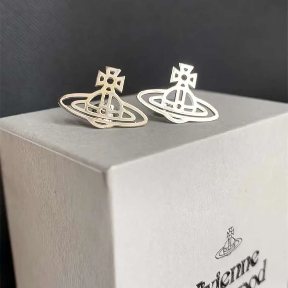 Desginer Viviene Westwoods Ouyang Nana's Same Western Empress Dowager Saturn Hollow Earrings Female French Simple Gold and Silver Two Color Smooth Planet Earrings