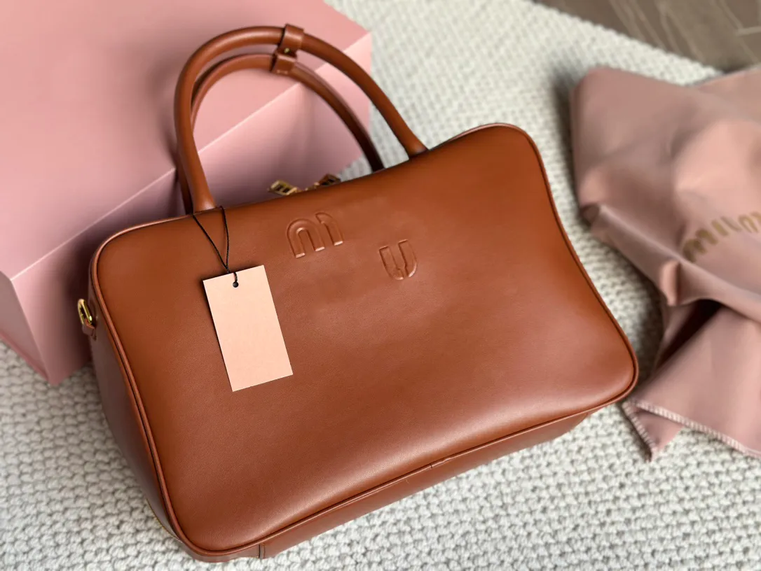 Bolso de diseñador Miui, bolso de cuero para mujer de alta calidad, bolso Boston, bolso de bolos de diseño de lujo, maletín de moda para mujer, bolso de mano de marca Miui