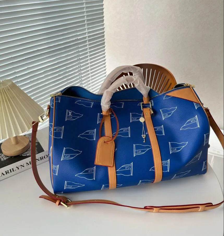 23 nouveaux sacs de voyage de style sac à bandoulière duffle hommes femmes sacs à bagages de qualité supérieure sac à bandoulière bleu 50 cm de luxe imprimé plat designer sac à main de grande capacité n40499