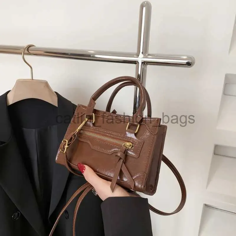 Axelväskor nya trendiga lyxdesigner vintage pu läder handväska liten mobiltelefon handväska forcatlin_fashion_bags