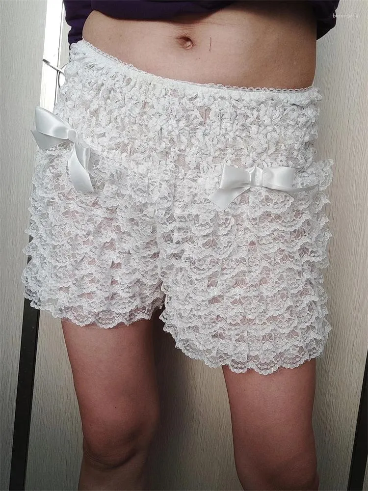 Kvinnors shorts kronstyle kvinnor sommar spets blommig casual ruffles bow lapptäck elastiska midja korta byxor för strand nattklubb streetwear