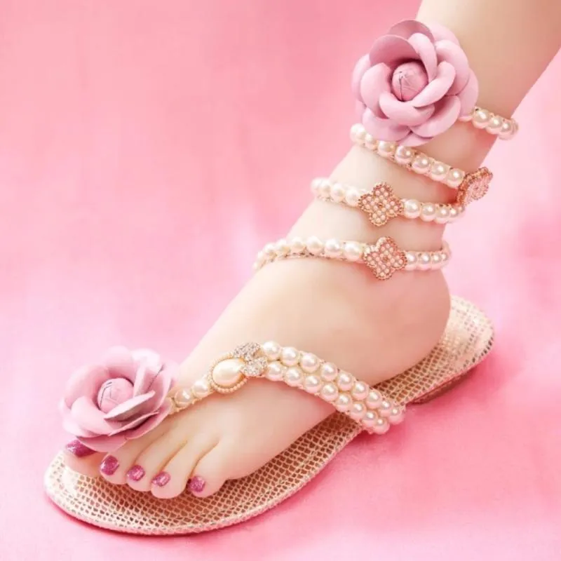 Sandaler Flat Floral Snake Strap Women Summer Shoes Pearl Flowers Gladiator Rhinestone Open Toe Sexiga damer