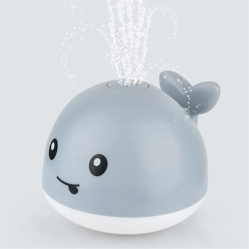 Bath Toys Baby Light Up Bath Tub Toys Whale Water Sprinkler Pool Toys For Toddlers Spädbarn Whale Water Sprinkler Pool Toy 230404