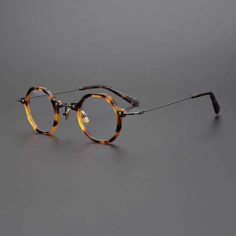 20% rabatt för lyxdesigners Elegant transparent färg japansk högkvalitativ oregelbunden runda glasögon full ram litterära myopia män kvinnor inte plockar ansikte trend