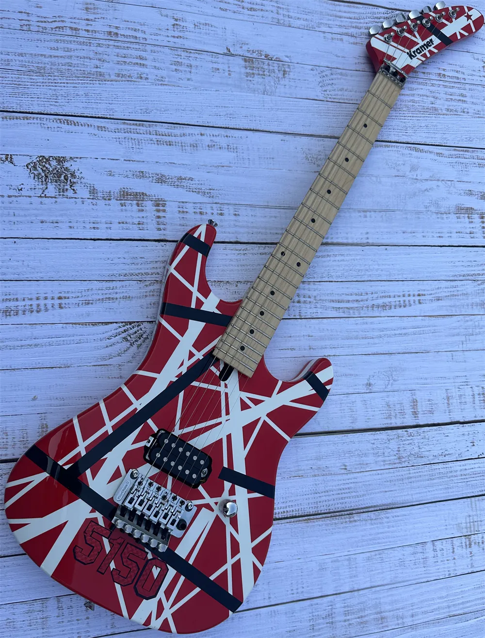 5150 electric guitar, imported alder body, Canadian maple fingerboard, signed, classic red and white stripes, lightning