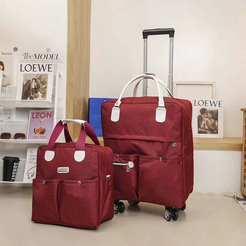 Ny vagn väska kvinnors stora kapacitet bagagepåse hand bagage väska vikning rese förvaring väska universal hjul ryggsäck