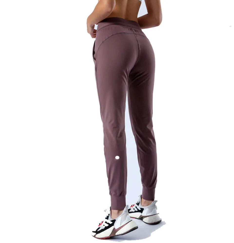 LL femmes Yoga neuvième pantalon pousser Fitness Leggings doux taille haute hanche ascenseur élastique décontracté Jogging 7 couleurs L2079 High quality Yoga pants for grouped legs