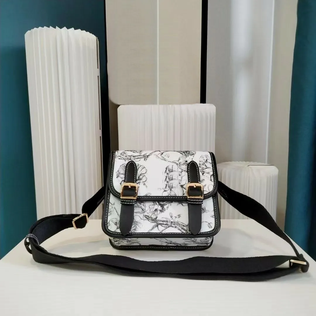Luksusowy designerski zimowy mody torby posłańca czarno -biała kreskówka torba na ramię płótno ścieg skórzany torba na ciało złoto sprzętowe podwójne klamry torebka