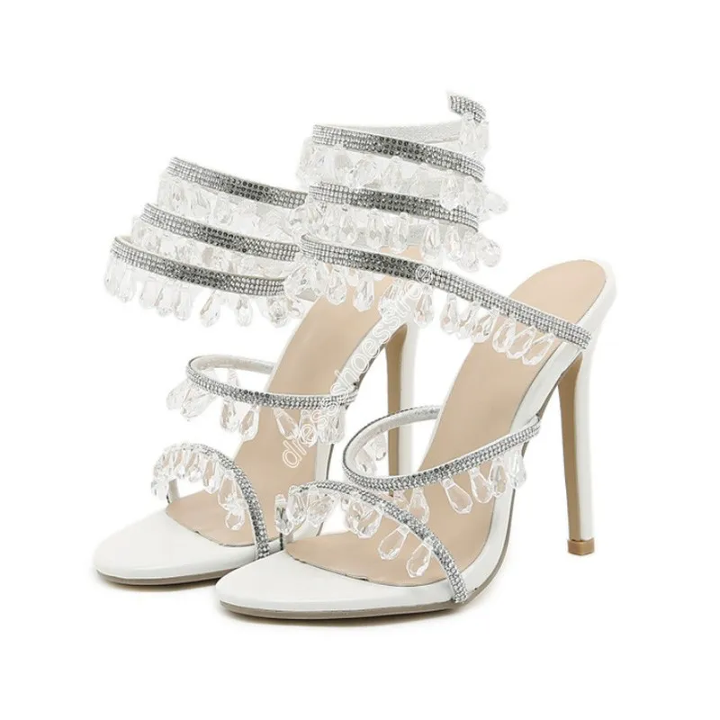 Nya lyxiga sandaler Fashion Glitter Rhinestones Ankel Kvinnors stilett Sandaler Kvinnliga tå bröllopsfestskor pumpar