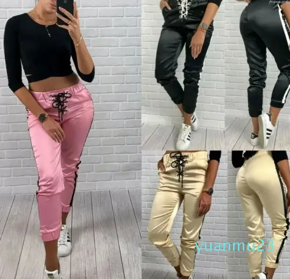 Abiti da yoga Pantaloni da donna di marca Pantaloni elasticizzati a vita alta da jogging Pantaloni skinny Tasche laterali Solido lungo Bnadge Moda autunnale