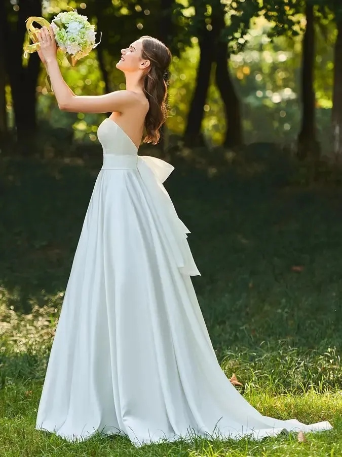 Simple Strapless Backless Satin A-Line Garden Wedding Dress with Bow Cascading Ruffles Sweep Train from Dhgate A-Line Wedding Dresses - price 89.45 Simple Strapless Backless Satin A-Line Garden Wedding Dress with Bow Cascading Ruffles Sweep Train from Dhgate A-Line Wedding Dresses - price 89.45
