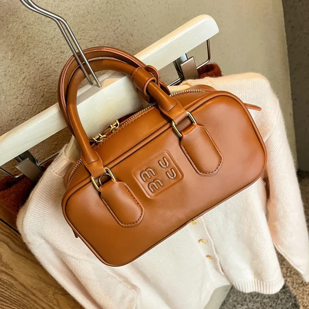 Echt leer Miui Luxe dame Bowlingtassen Dames heren Avond Arcadie Clutch Bags Cross Body Totes handtassen modeontwerper camera pochette sling Schoudertas