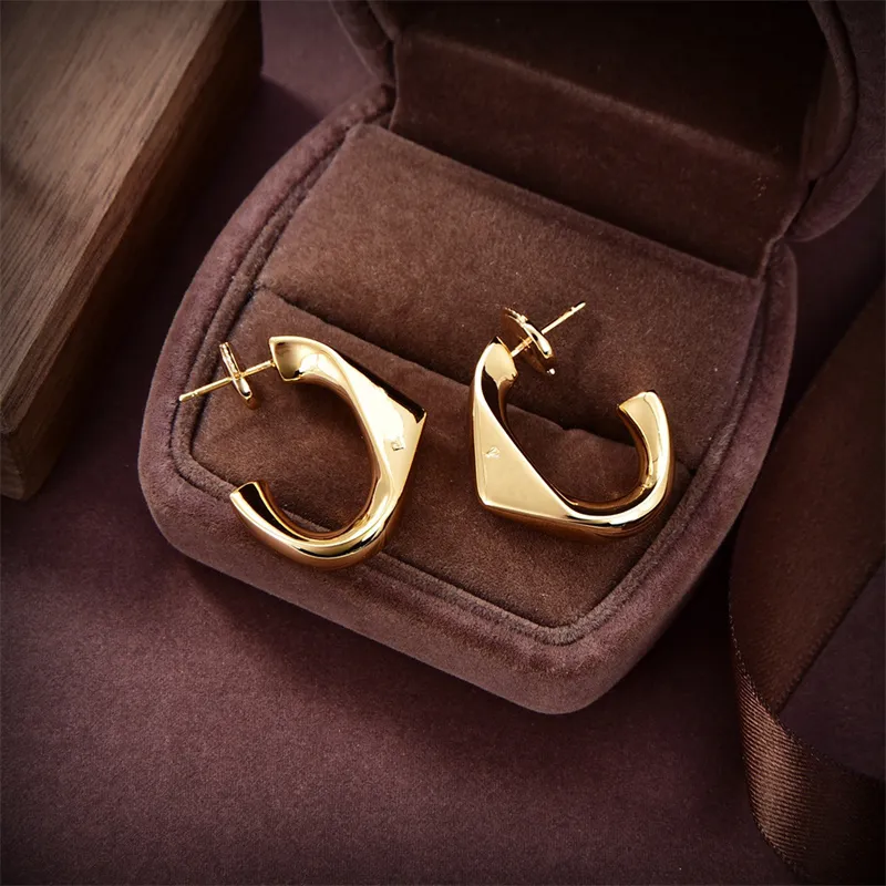 Designer Gold Earring Womens Mens Ear Stud Par Luxury örhängen smycken gåvor Kvinna Tillbehör Ornament Klassisk brevtryck öronring