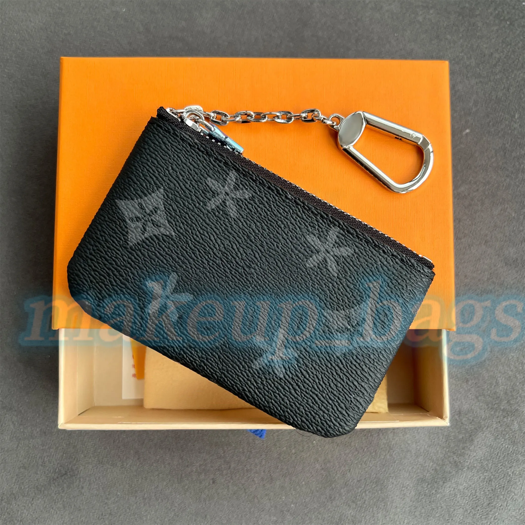 Kartenhalter Schlüsselanhänger aus echtem Leder M62650 Damen-Schlüsselgeldbörse Herrenbrieftasche Mit Schlüsselanhänger-Box Luxus-Designer kleine Zippy-Geldbörsen Geldbörsen CardHolder Schlüsseltasche