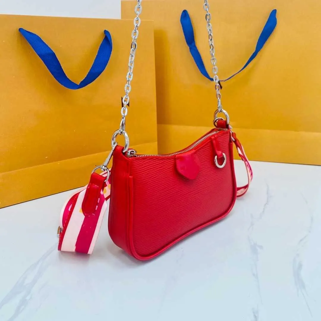 Bolsas de designer de marca feminina bolsas de ombro de ombro bola de crossbody toute nova textura de moda cadeia de couro saco de saco de mensageiros de banda de envelope de envelope fábrica de fábrica de venda direta