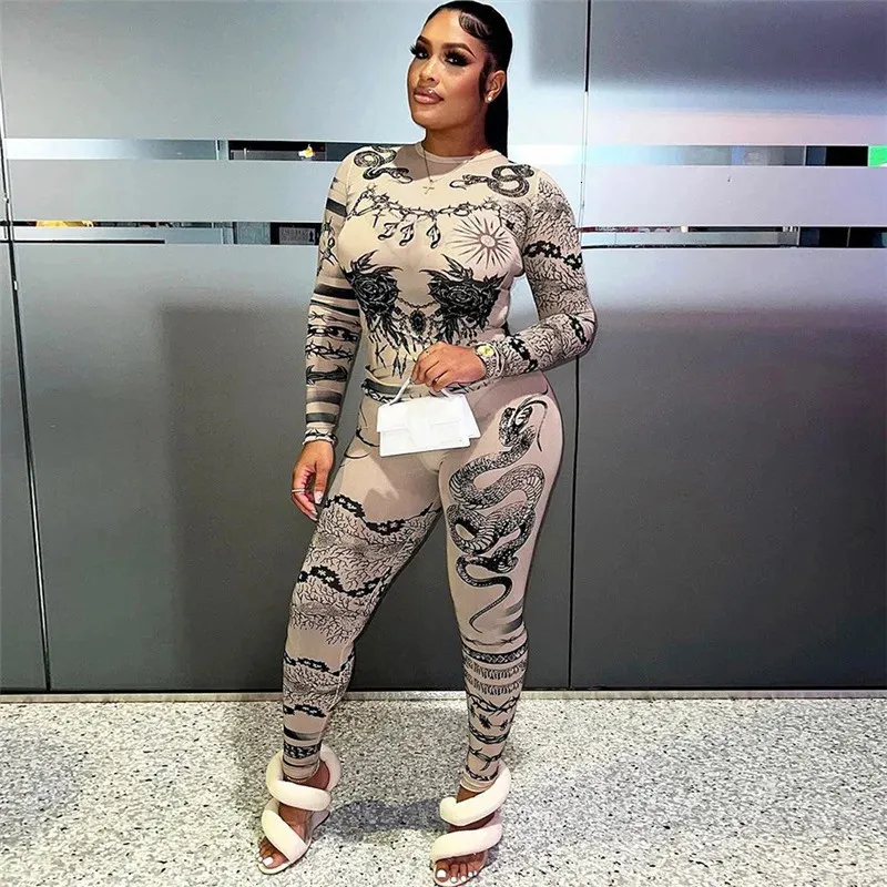 Kvinnors tvåbitar byxor Fashion Print Sexig kvinnlig träning Se genom 2 Set Hipster Crop Tops Leggings Stretch Streetwear Matching Suit 231107