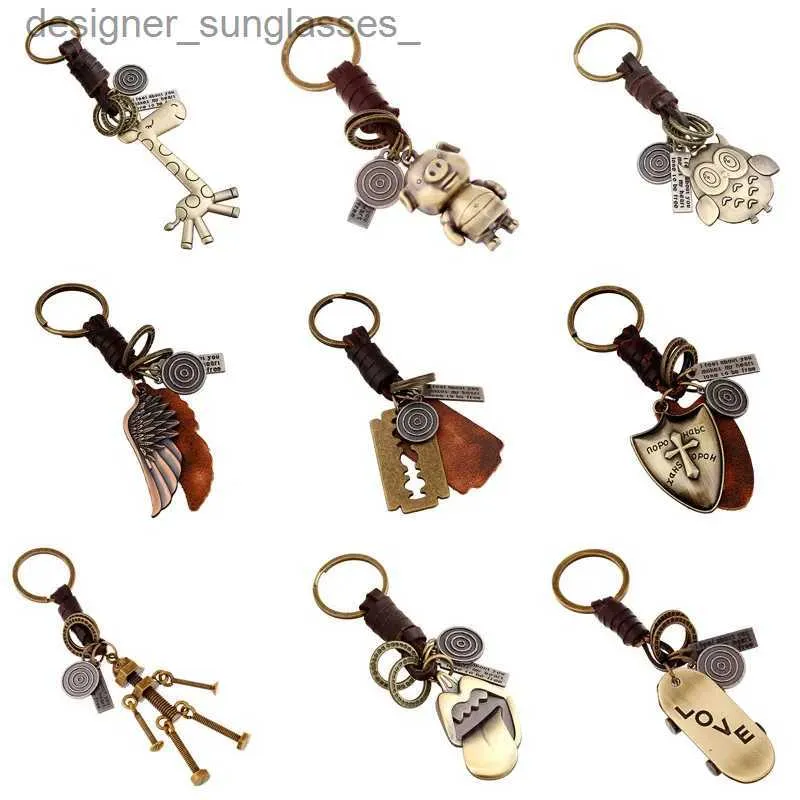 Keychains Lanyards Zorcvens 2023 Ny äkta läder Keychain Punk Rock Vintage Animal Feather Robot Key Chains For Man Woman Jewelry Giftl231107