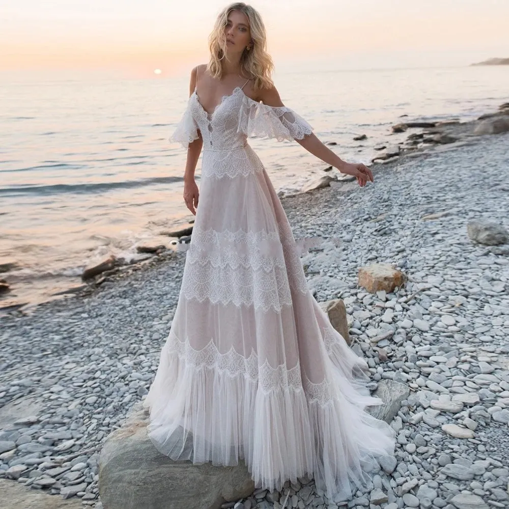 Abito da sposa bohemien allettante champagne nudo scollo a V maniche chic cinghie volant pizzo una linea abiti da sposa senza schienale Abiti da sposa