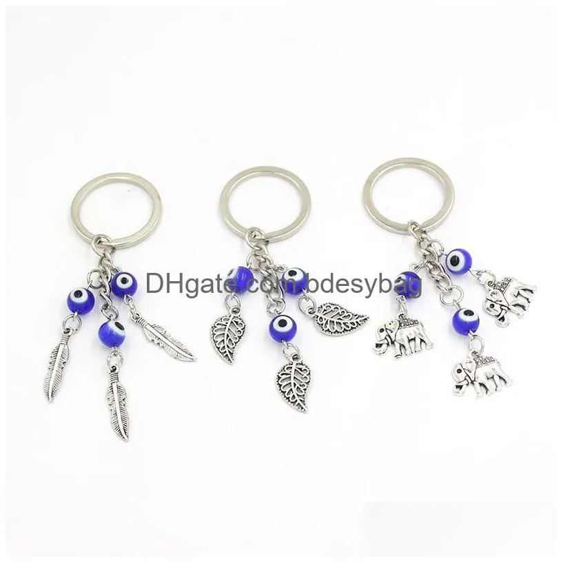 Sleutelhangers Groothandel Lucky Evil Eye Sleutelhanger Autosleutelhangers Keramiek Blauwe Veer Blad Olifant Sleutelhanger Voor Vrouwen Sieraden Gift Drop Deli Dhf85