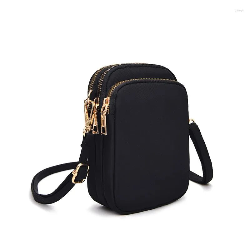 Bolsas de noite Bolsa de telefone celular casual Bolsa de telefone Oxford Fabric Crossbody fêmea pequena bolsa de ombro Mensageiro sólido para