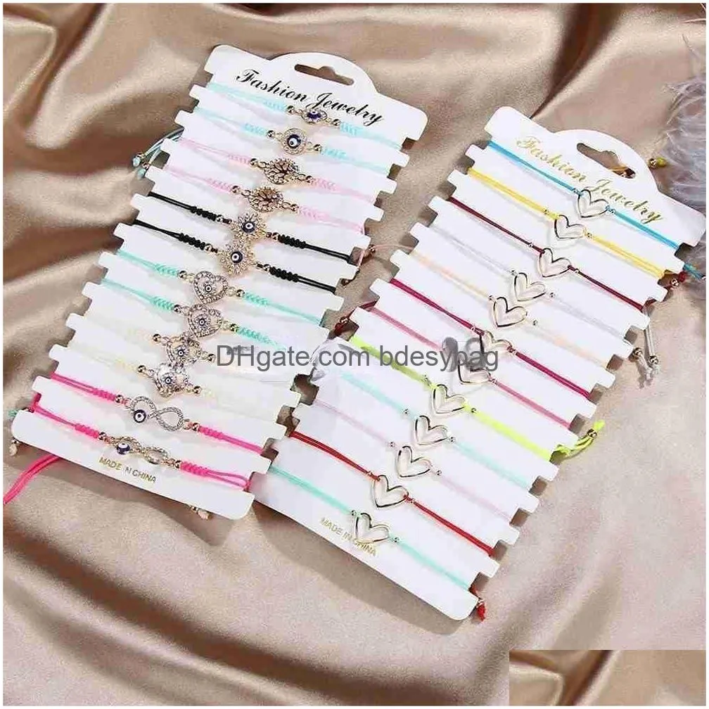 Charm Bracelets Charm Bracelets 12Pcs/Lot Hollow Heart Braided For Women Girl Crystal Evil Eye Handmade Thin String Rope Bracelet Part Dhksg