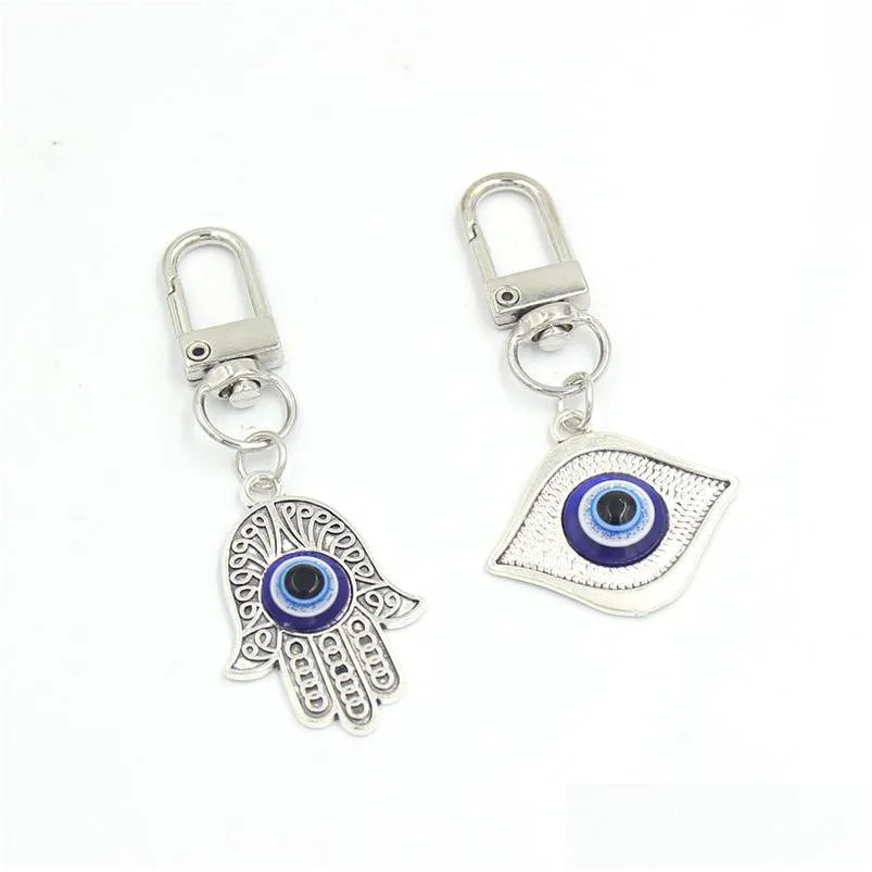 Sleutelhangers Lucky Blue Evil Eye sleutelhanger Hamsa Hand sleutelhangers Pl rits charme Planner Charms Hangbag portemonnee tas sleutelhangers geschenken Dhgarden Dhsz2