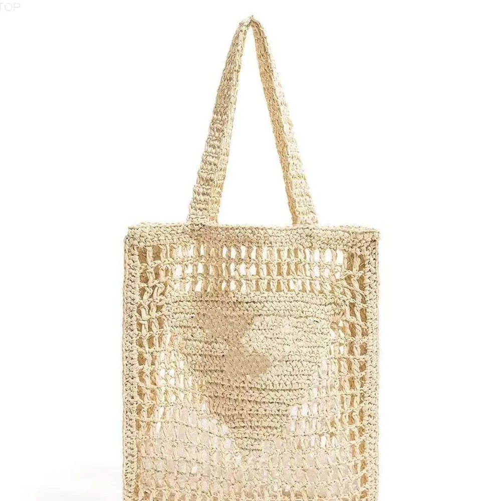 Klassisk designer Tote Luxury Bag Brands Hollow Letters Raffia Straw Handväskor Tote Fashion Paper Woven Crossbody Women Shoulder Bags Summer Beach Handbag Y22040156