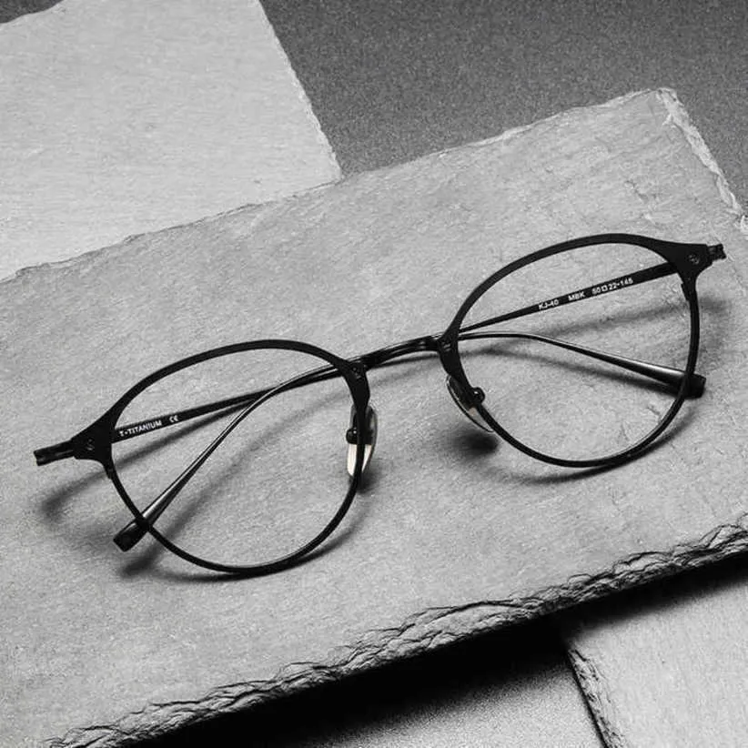 Lyxdesigner sommarsolglasögon japanska guldglasögon Samma KJ-40 kan utrustas med en kortsiktig elliptisk ren titannätröd ögonram