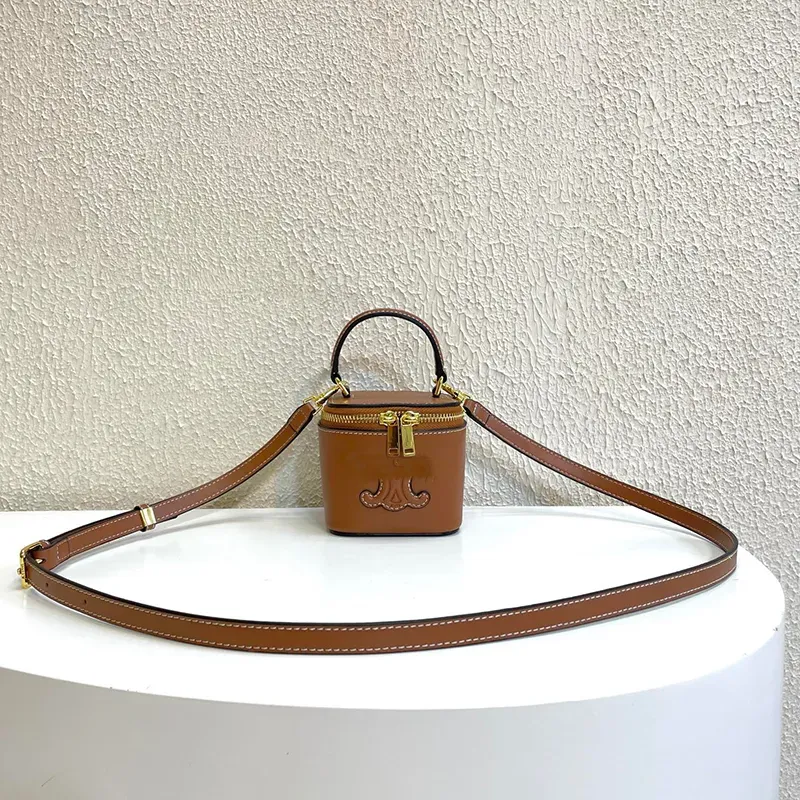 Mode Luxurys designer väska läder handväska mini tote box väska triomphe arch armpit väska exklusiv utgåva härlig justerbar kvinnors axel crossbody