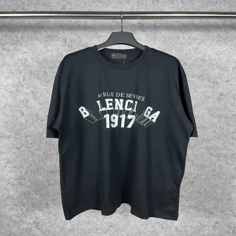 Ensemble de vêtements de sport à manches courtes pour hommes et femmes de créateurs de luxe High Edition 2023 Summer New Family 1917 Series 3D Letter Burst Print et T-shirt à manches courtes