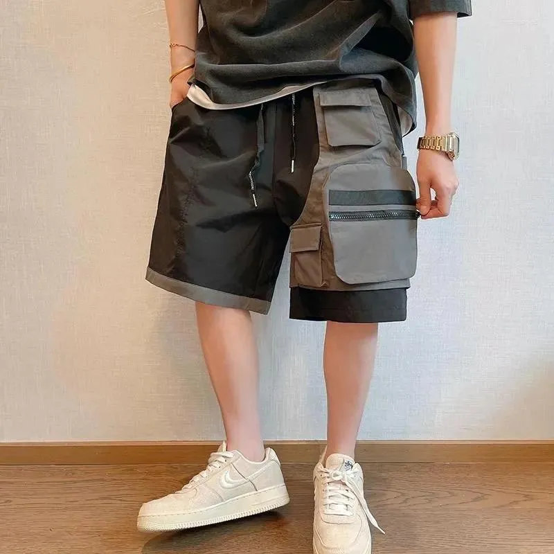 Herr shorts män kläder svart grå lapptäcke ficklast kvartal baggy byxor sommar koreansk mode kort homme streetwear