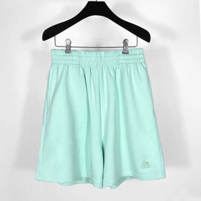 conjunto de ropa deportiva de manga corta para hombres y mujeres del diseñador Camisa de alta edición Deportes familiares de lujo bordados Verde menta y pantalones cortos sueltos Capris