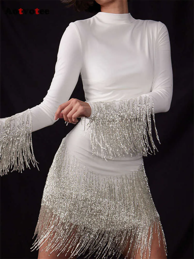 Effen jurken voor dames Nieuwe mode Vintage chique elegante lange mouwen kwastje O-hals hoge taille avondjurk