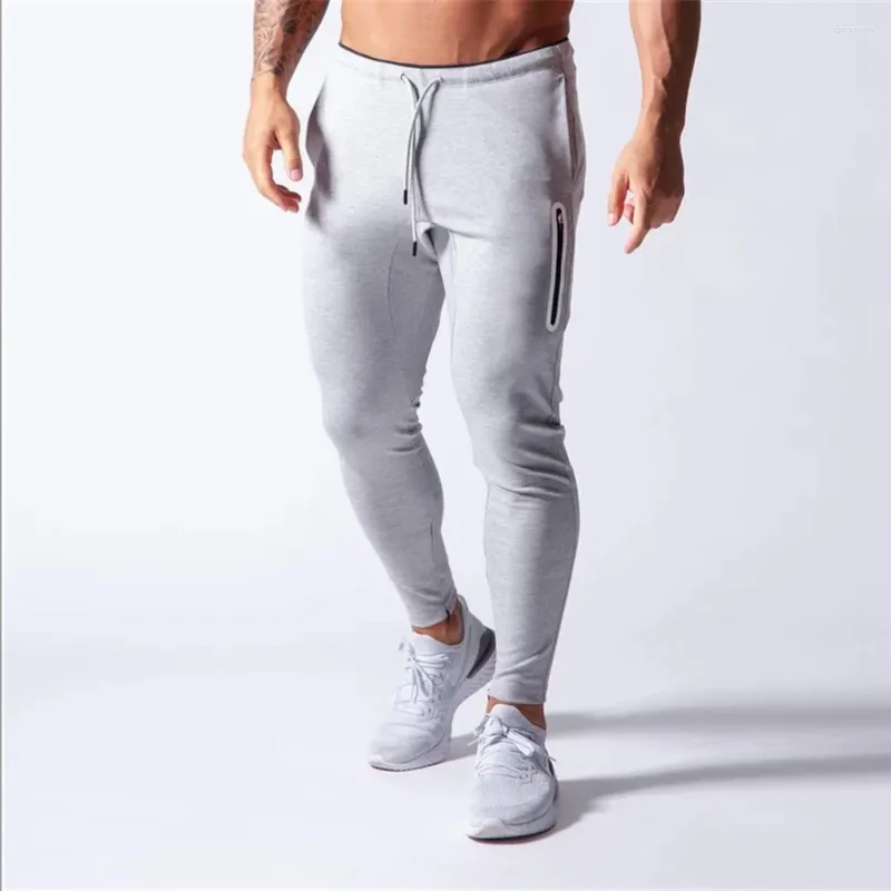 Pantaloni da uomo Uomo Casual Skinny Jogging Pantaloni sportivi da corsa Maschile Pure FootTrack Tasche con cernieraPantaloni da allenamento Fitness da palestra