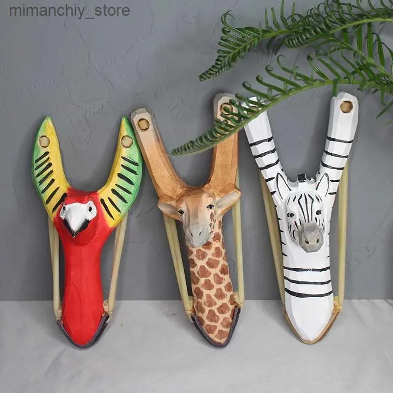 Jakt slingshots Creative Wood Carving Animal Slingshot Toy Cartoon Animals Handmålad trästaty Doll Crafts Kids Favoritgåva för utomhus Q231110