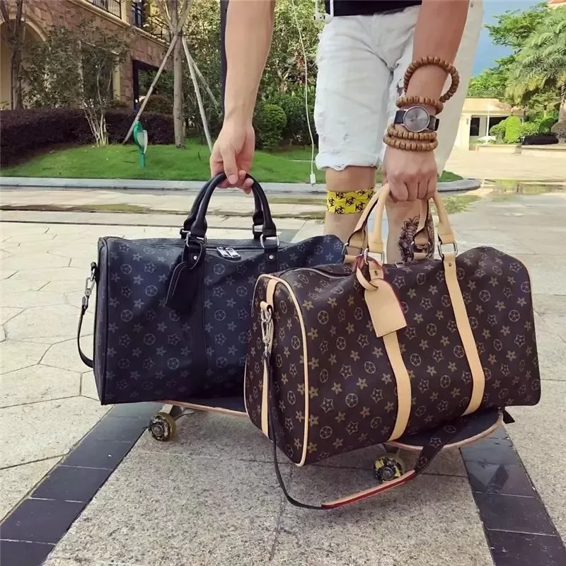 Top Designers fashion duffel bags luxury men female travel bags leather handbags large capacity holdall carry on luggage overnight weekender bag with lock 41414