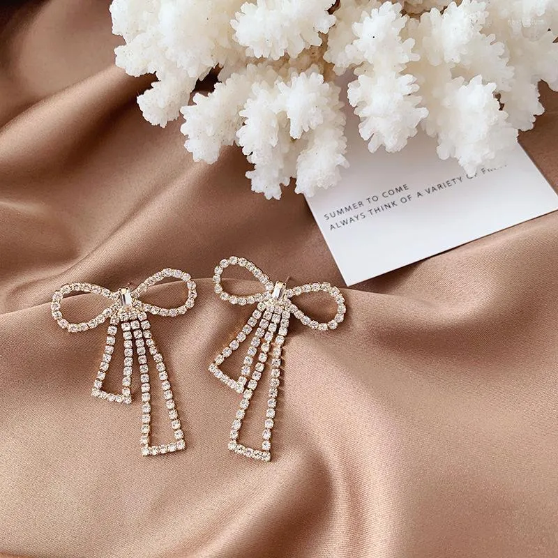 Boucles d'oreilles à dos avec pompons coréens, grand nœud, luxe pour femmes, tempérament, strass brillant, Clip à nœud sans Piercing