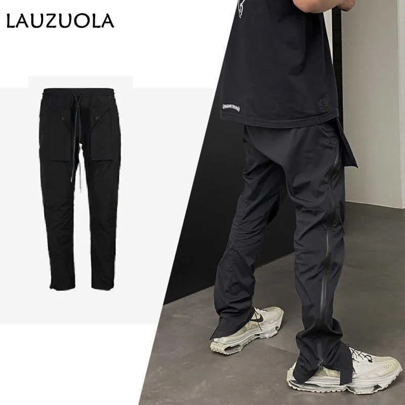 Herenbroek Hoogwaardige luxe zijde Zipper Split Pants Men 2023 Nieuwe mode Koreaanse stijl Casual elastische dstring taille lading Pant voor man Z0410