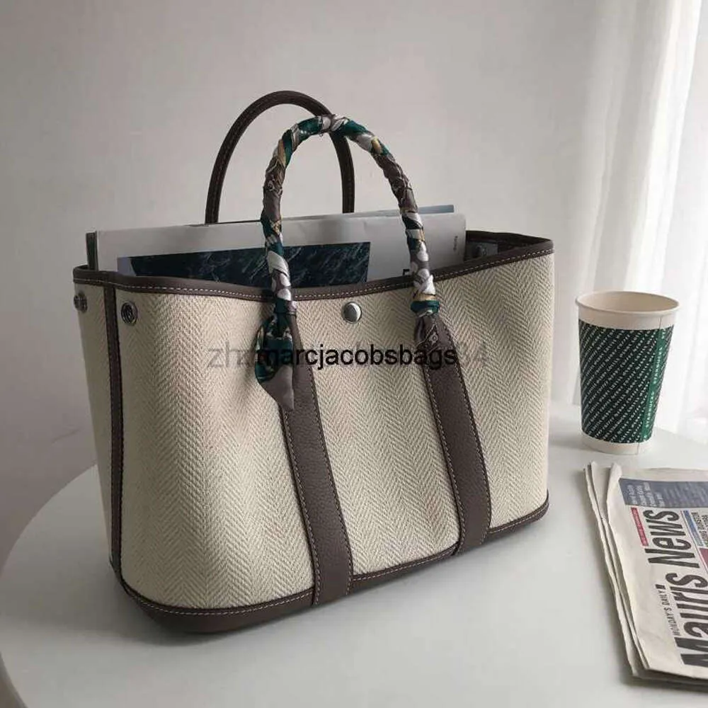 Bolsa de fiesta de jardín Luxury Bolsos de bolsos de jardín Color de fiesta Bolsa de compras de 30 cm lienzo ligero con mujer de vaca para mujeres de vaca