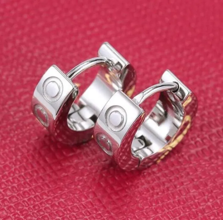 デザイナースタッドピアス女性ジュエリーギフト高品質チタン鋼スタッドラブイヤリング絶妙なシンプルなファッション女性 925 シルバーダイヤモンドイヤリング