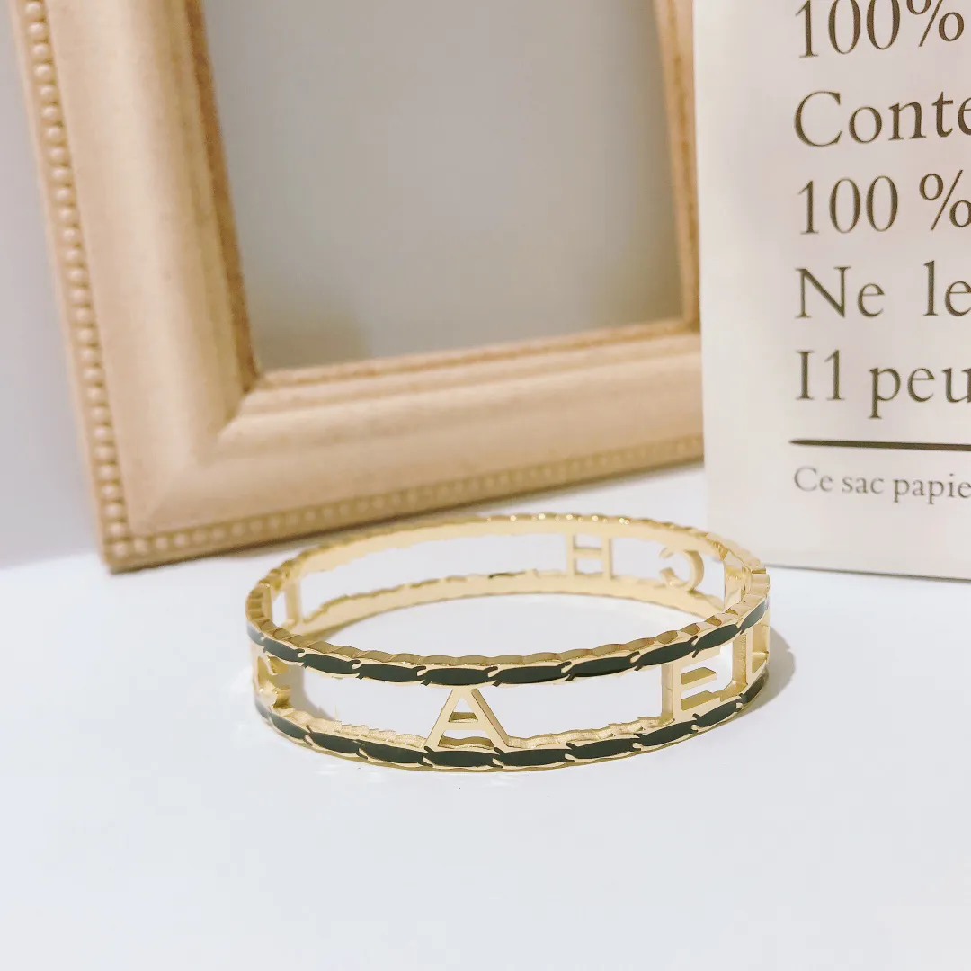 18K Goud Bangle armbandontwerper Spring Love Cuff Bracelet Luxe Dames roestvrijstalen stalen armband Romantisch ontwerp Familie geschenken sieraden Groothandel met merkbox