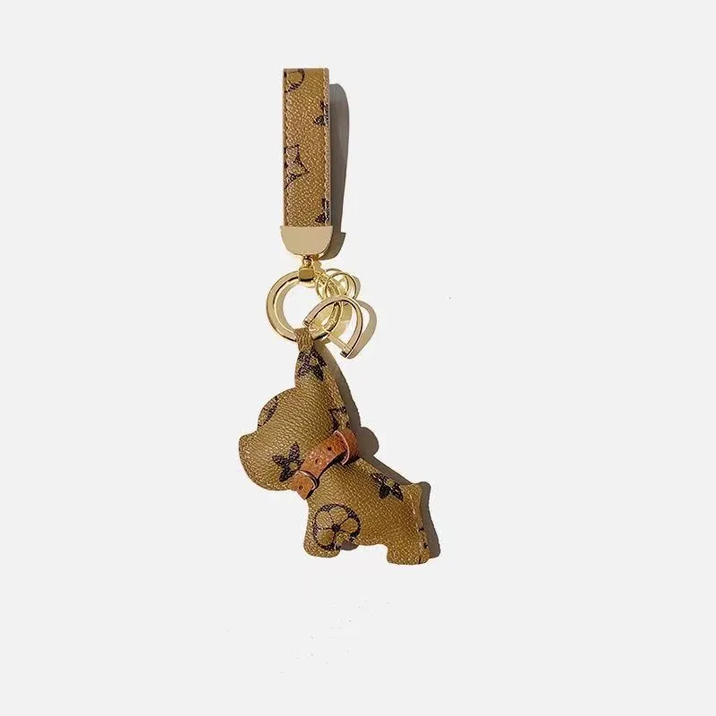 Llavero Bulldog de cuero Floral marrón, bolso de mano para hombre y mujer, accesorios para equipaje, colgante para coche para amantes