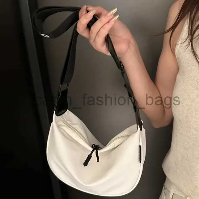 Axelväskor Summer Canvas Dumpling Bag 2023 Tide Ladies Casure Crossbody Bag For Teen Girls Women's Messenger Bagcatlin_fashion_bags