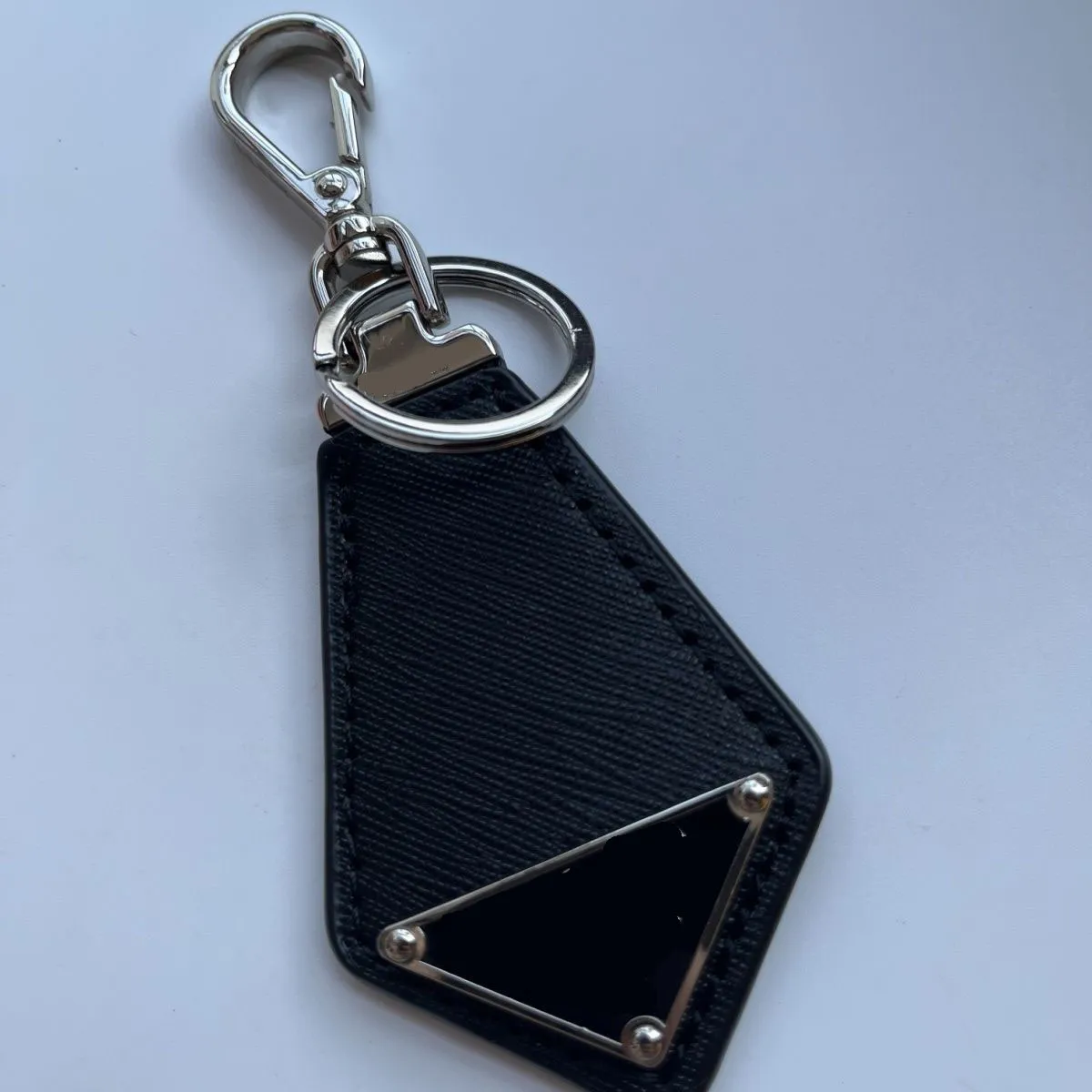 DHgate.com:Leather Keychain with Metal Triangle Pendant