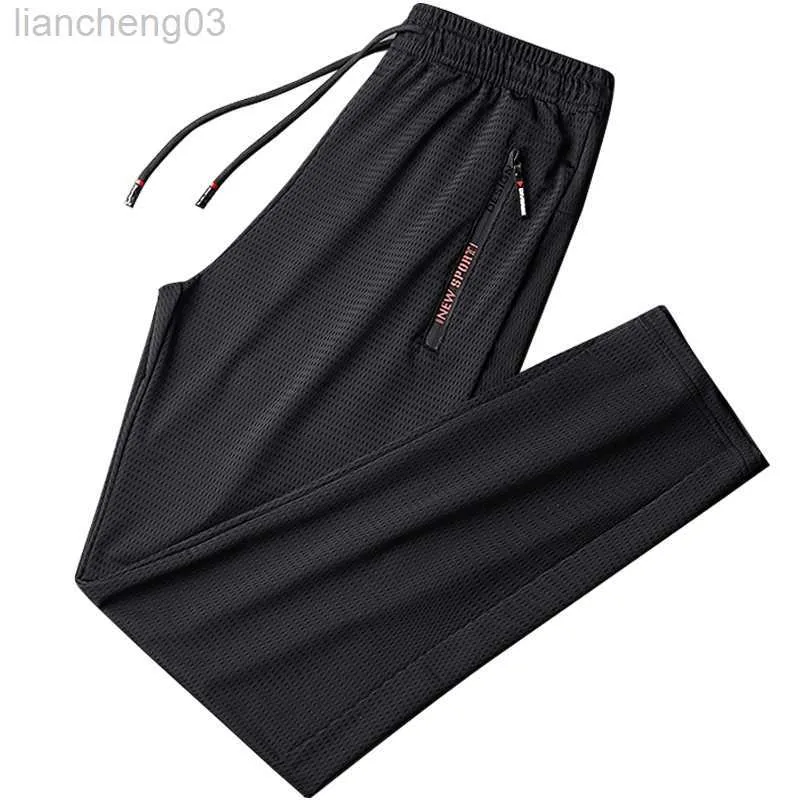 Pantaloni da uomo Estate Maglia traspirante Pantaloni sportivi neri Pantaloni da uomo Pantaloni sportivi Pantaloni larghi Pantaloni casual da uomo 7XL 8XL 9XL W0411