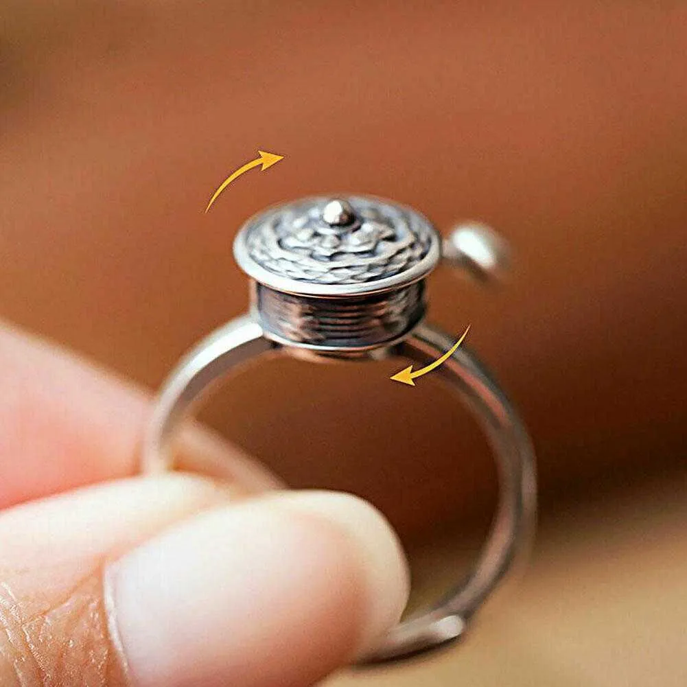 Buddhist store spinner ring