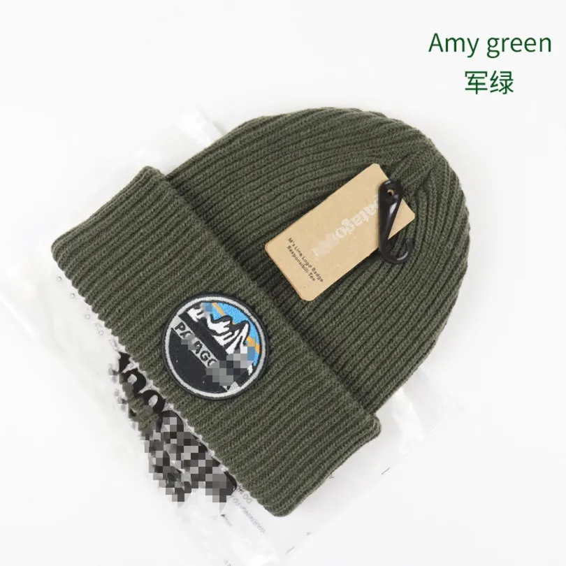 Factory wholesale brand Europe and America autumn and winter knitted hat new double wool hat solid color tooling to keep warm.