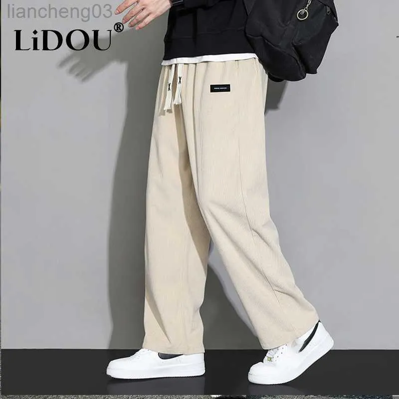 Pantalones de hombre Primavera Otoño Moda Temperamento Pana coreana Pantalones anchos Hombre Suelto Casual Color sólido Hombre Pantalones de chándal Ropa de calle W0411