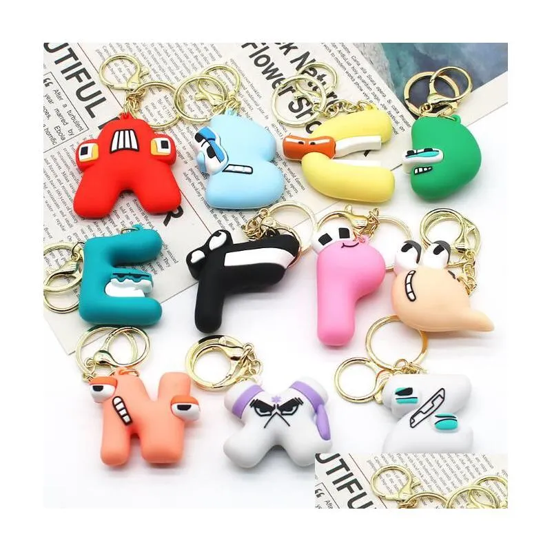 11 Letter Cartoon Alphabet Keychain Drip Glue Doll Weird Pattern Keychains For Girl Boy Pendant Bag Accessory Drop Delivery Dhbuz